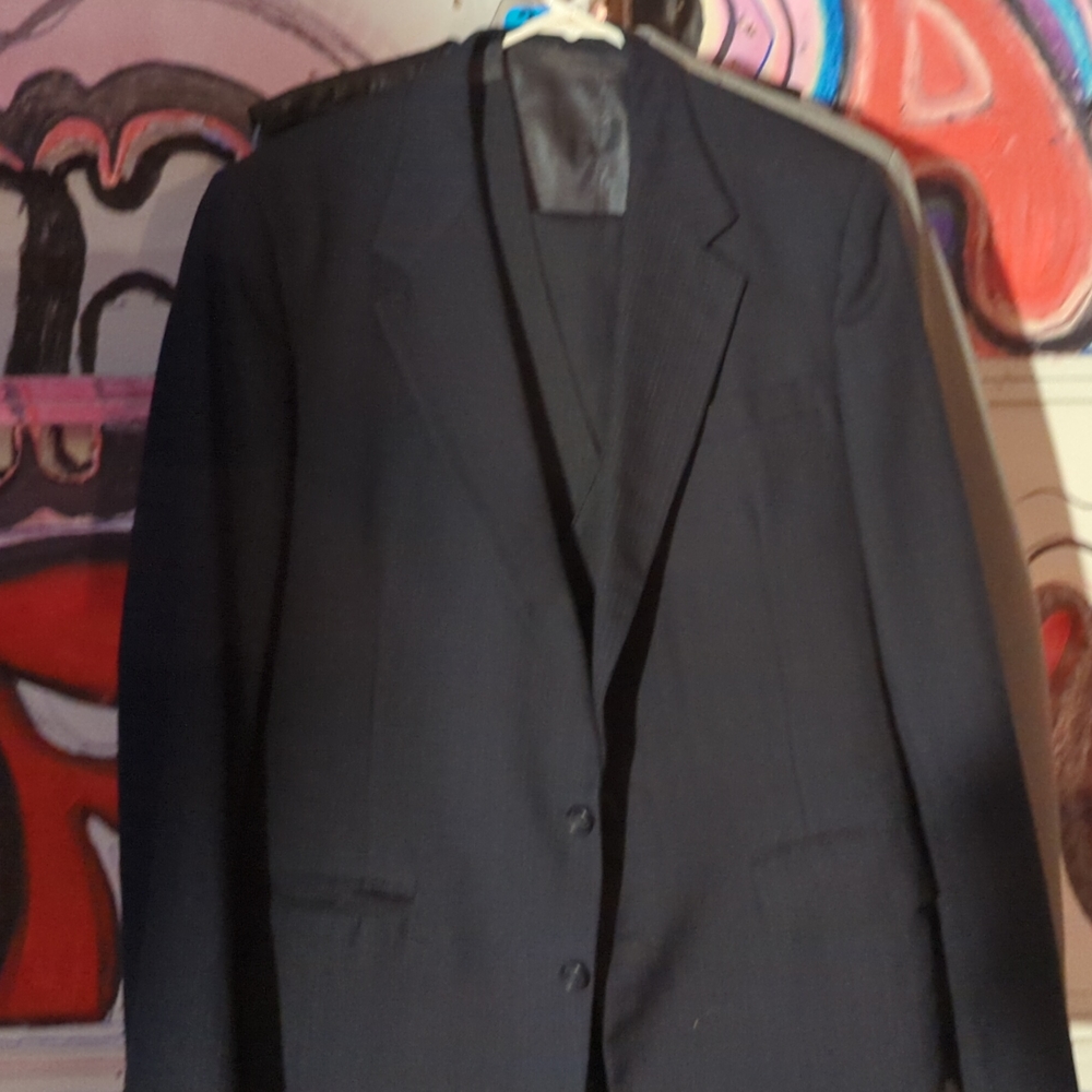 Brand new with out tags jacket,vest and pants dress suit